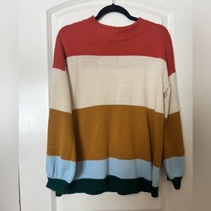 Polagram Women’s Size Medium color block bell sleeved sweater.